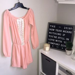 Pink romper with lace front